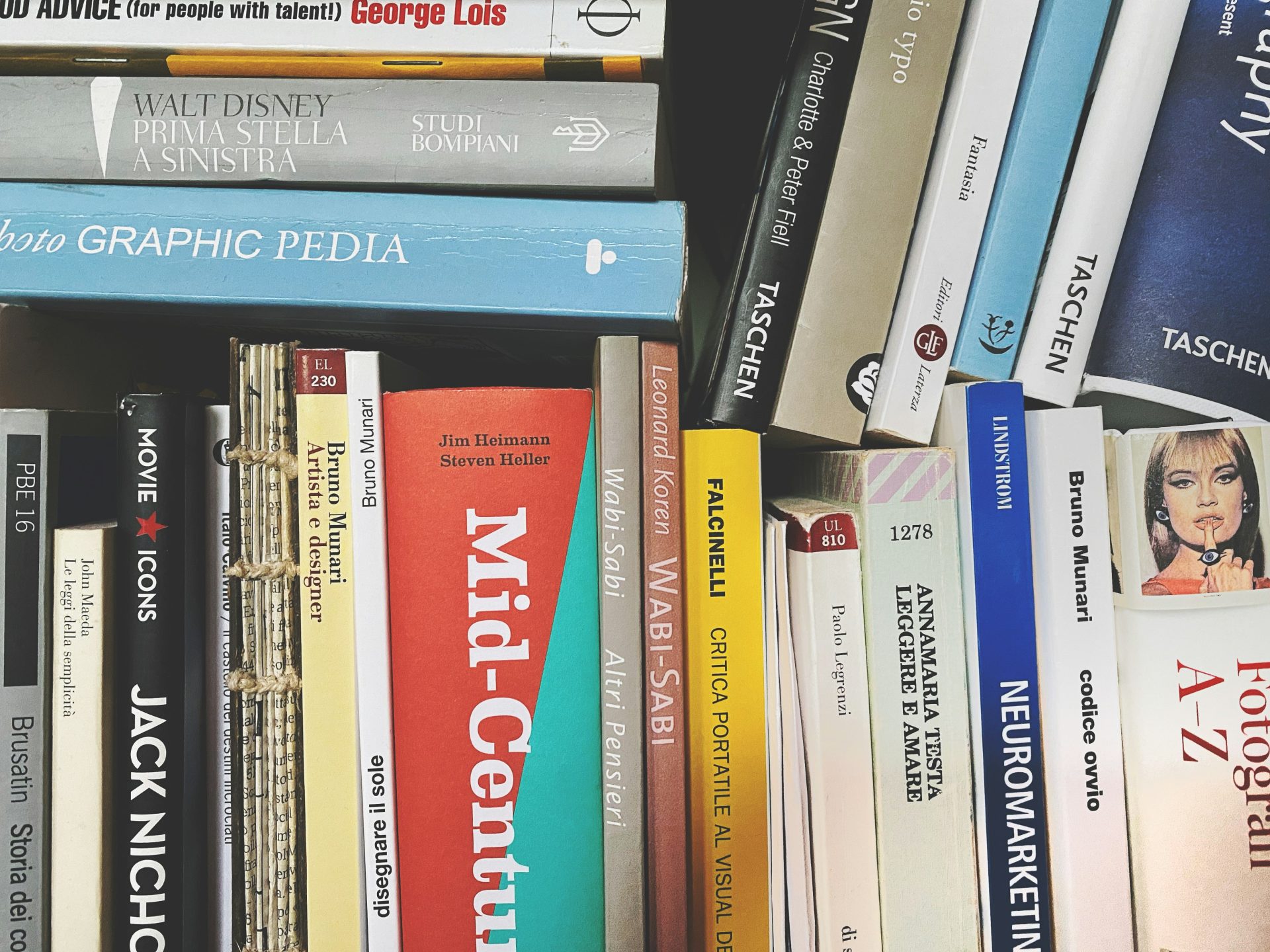 books on black wooden shelf